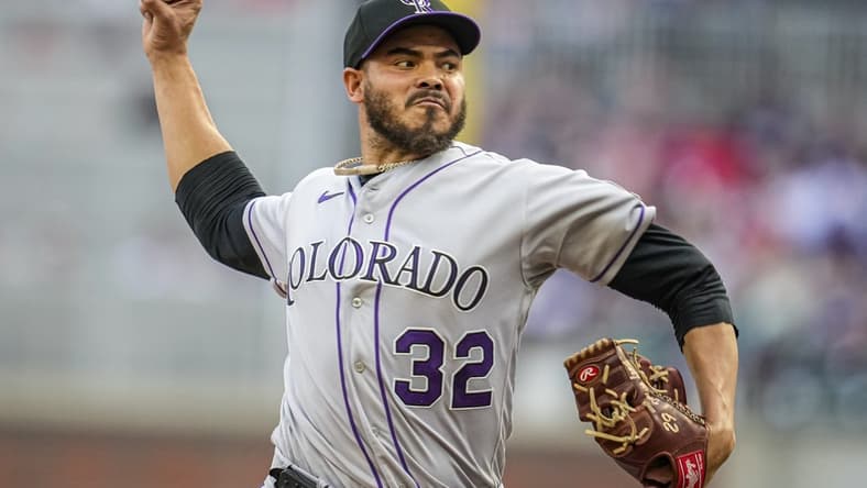 Jun 16, 2023; Cumberland, Georgia, USA; Colorado Rockies starting pitcher Dinelson Lamet (32) pitches against the Atlanta Braves during the first inning at Truist Park. Mandatory Credit: Dale Zanine-USA TODAY Sports