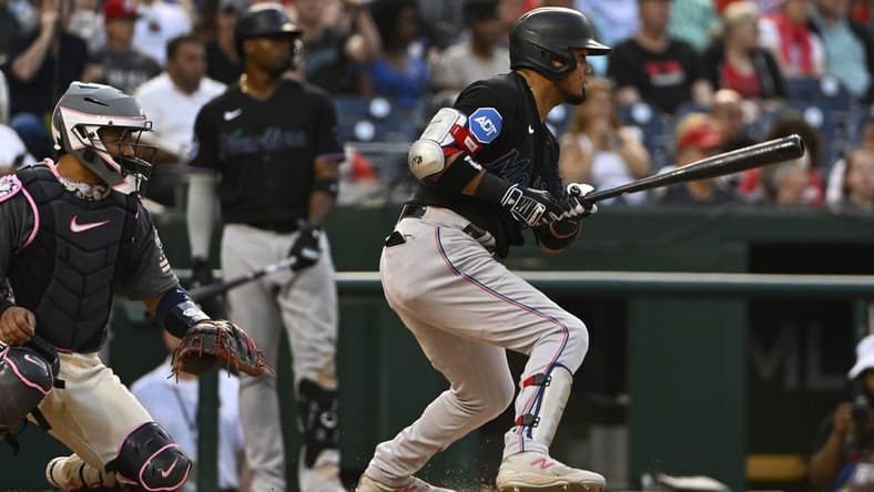 Jun 16, 2023; Washington, District of Columbia, USA; Miami Marlins second baseman Luis Arraez (3) hits a RBI single against the Washington Nationals during the fourth inning at Nationals Park. Mandatory Credit: Brad Mills-USA TODAY Sports