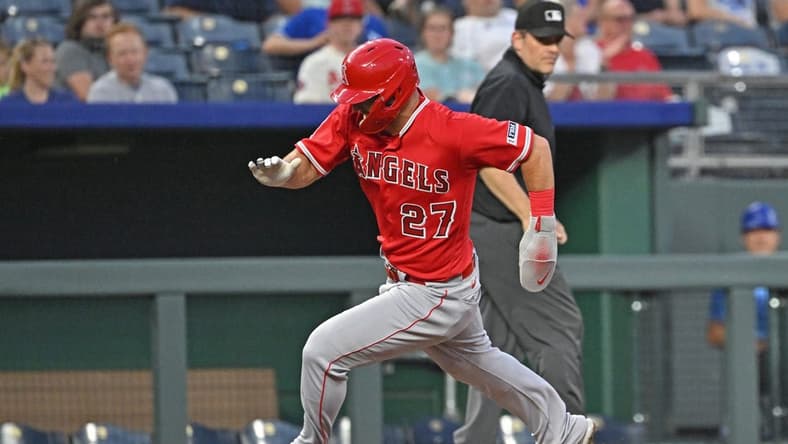 Jun 16, 2023; Kansas City, Missouri, USA; Los Angeles Angels center fielder Mike Trout (27) rounds third to score a run in the sixth inning against the Kansas City Royals at Kauffman Stadium. Mandatory Credit: Peter Aiken-USA TODAY Sports