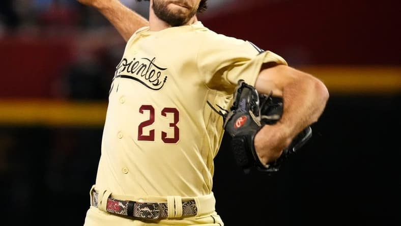 Jun 16, 2023; Phoenix, AZ, USA; Arizona Diamondbacks starting pitcher Zac Gallen (23) throws to the Cleveland Guardians in the first inning at Chase Field. Mandatory Credit: Rob Schumacher-Arizona Republic