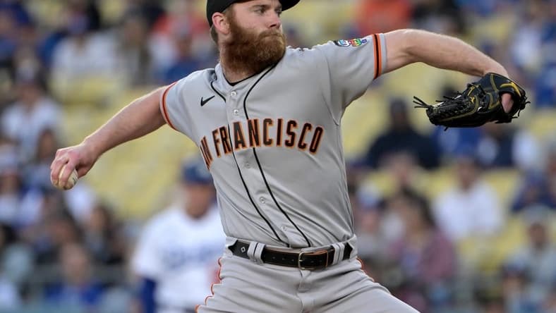 Jun 16, 2023; Los Angeles, California, USA; San Francisco Giants relief pitcher John Brebbia (59) pitches in the first inning against the Los Angeles Dodgers at Dodger Stadium. Mandatory Credit: Jayne Kamin-Oncea-USA TODAY Sports