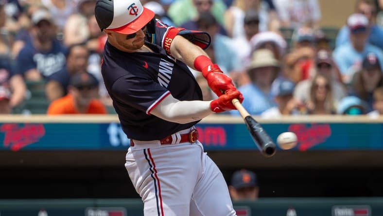 Jun 17, 2023; Minneapolis, Minnesota, USA; Minnesota Twins catcher Ryan Jeffers (27) drives in a run with a fielders choice against the Detroit Tigers in the fifth inning at Target Field. Mandatory Credit: Jesse Johnson-USA TODAY Sports