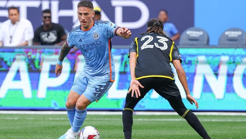 Jun 17, 2023; New York, New York, USA; New York City FC defender Braian Cufre (3) plays the ball against Columbus Crew defender Mohamed Farsi (23) during the first half at Yankee Stadium. Mandatory Credit: Vincent Carchietta-USA TODAY Sports