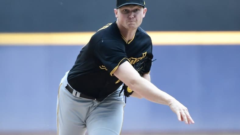 Jun 17, 2023; Milwaukee, Wisconsin, USA; Pittsburgh Pirates pitcher Mitch Keller (23) pitches against the Milwaukee Brewers in the first inning at American Family Field. Mandatory Credit: Benny Sieu-USA TODAY Sports