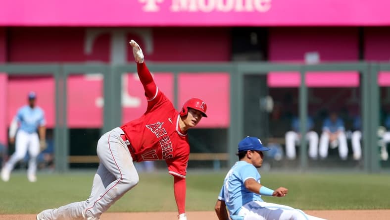 Jun 17, 2023; Kansas City, Missouri, USA; Los Angeles Angels designated hitter Shohei Ohtani (17) reacts to being tagged out by Kansas City Royals second baseman Nicky Lopez (8) during the fourth inning at Kauffman Stadium. Mandatory Credit: Scott Sewell-USA TODAY Sports