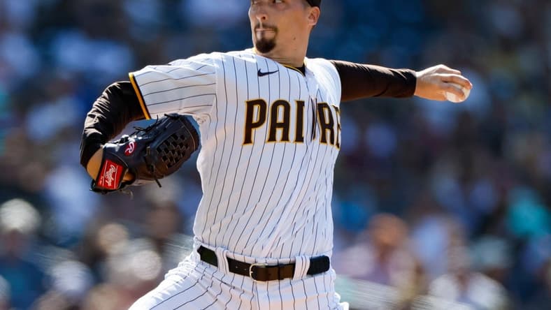 Jun 17, 2023; San Diego, California, USA; San Diego Padres starting pitcher Blake Snell (4) throws a pitch against the Tampa Bay Rays in the first inning at Petco Park. Mandatory Credit: David Frerker-USA TODAY Sports