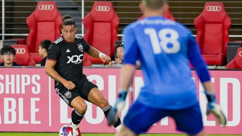 Jun 17, 2023; Washington, District of Columbia, USA; D.C. United forward Erik Hurtado (9)  dribbles as Real Salt Lake goalkeeper Zac MacMath (18) defends during the second  half  at Audi Field. Real Salt Lake defeated D.C. United 2-1.Mandatory Credit: Tommy Gilligan-USA TODAY Sports