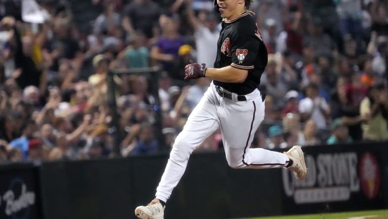Jun 17, 2023; Phoenix, AZ, USA; Arizona Diamondbacks Jake McCarthy (31) rounds third base after hitting a home run against the Cleveland Guardians at Chase Field.