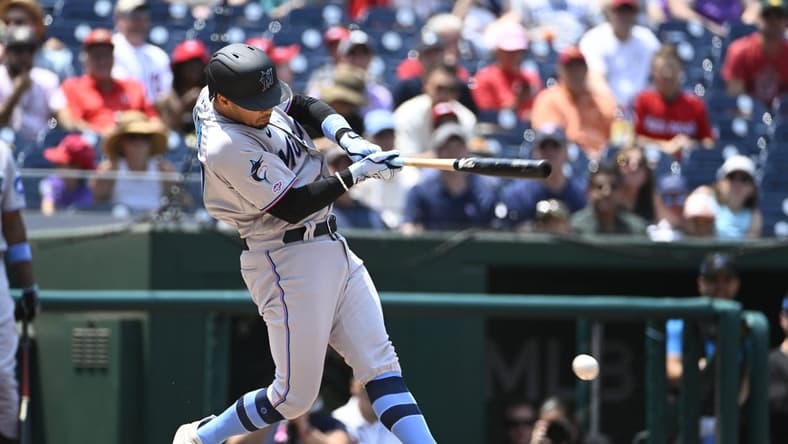 Jun 18, 2023; Washington, District of Columbia, USA; Miami Marlins shortstop Jacob Amaya (67) hits a RBI fielders choice against the Washington Nationals during the second inning at Nationals Park. Mandatory Credit: Brad Mills-USA TODAY Sports