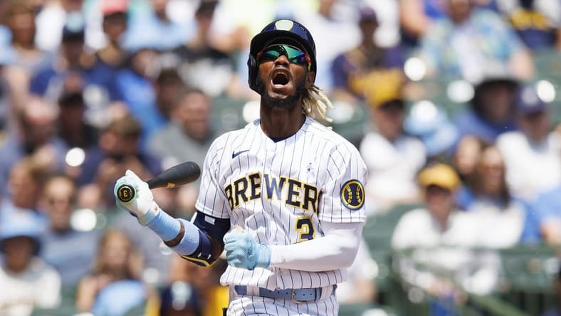 Jun 18, 2023; Milwaukee, Wisconsin, USA; Milwaukee Brewers right fielder Raimel Tapia (3) reacts after striking out during the second inning against the Pittsburgh Pirates at American Family Field. Mandatory Credit: Jeff Hanisch-USA TODAY Sports