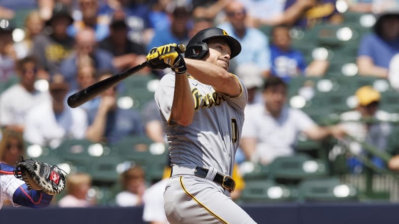 Jun 18, 2023; Milwaukee, Wisconsin, USA; Pittsburgh Pirates designated hitter Bryan Reynolds (10) hits a home run during the third inning against the Milwaukee Brewers at American Family Field. Mandatory Credit: Jeff Hanisch-USA TODAY Sports