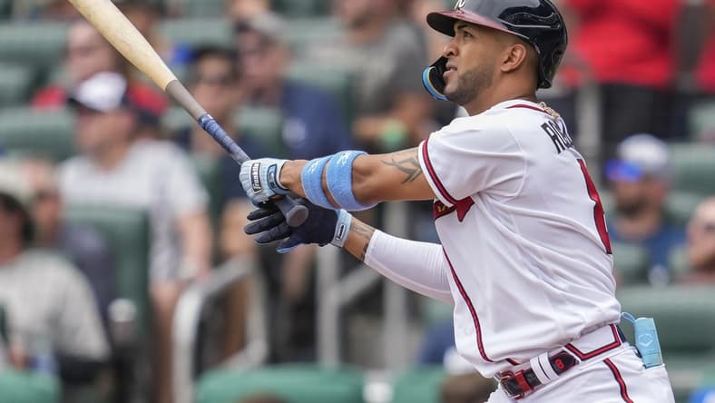Jun 18, 2023; Cumberland, Georgia, USA; Atlanta Braves left fielder Eddie Rosario (8) watches after hitting a three run home run Colorado Rockies during the second inning at Truist Park. Mandatory Credit: Dale Zanine-USA TODAY Sports