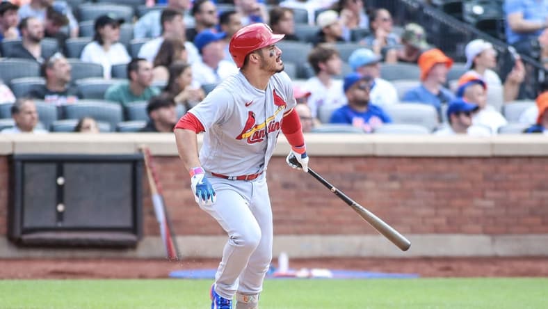 Jun 18, 2023; New York City, New York, USA; St. Louis Cardinals third baseman Nolan Arenado (28) hits a solo hime run in the ninth inning against the New York Mets at Citi Field. Mandatory Credit: Wendell Cruz-USA TODAY Sports