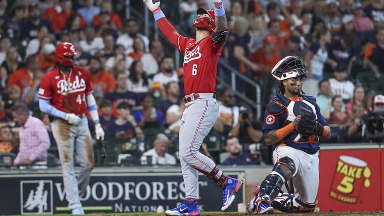 Jun 18, 2023; Houston, Texas, USA; Cincinnati Reds second baseman Jonathan India (6) crosses the plate past Houston Astros catcher Martin Maldonado (15) after hitting a home run during the eighth inning at Minute Maid Park. Mandatory Credit: Troy Taormina-USA TODAY Sports