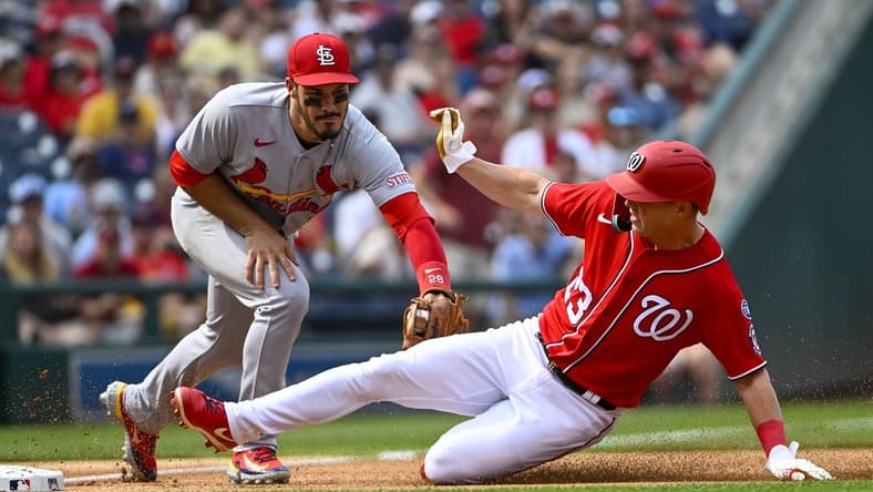 Jun 19, 2023; Washington, District of Columbia, USA; St. Louis Cardinals third baseman Nolan Arenado (28) tags out Washington Nationals left fielder Corey Dickerson (23) to end the first inning at Nationals Park. Mandatory Credit: Brad Mills-USA TODAY Sports