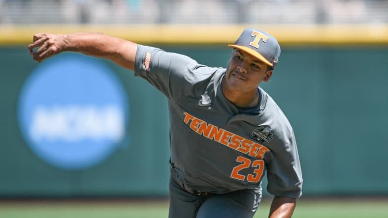 Jun 19, 2023; Omaha, NE, USA; Tennessee Volunteers pitcher Chase Burns (23) throws against the Stanford Cardinal in the fourth inning at Charles Schwab Field Omaha. Mandatory Credit: Steven Branscombe-USA TODAY Sports