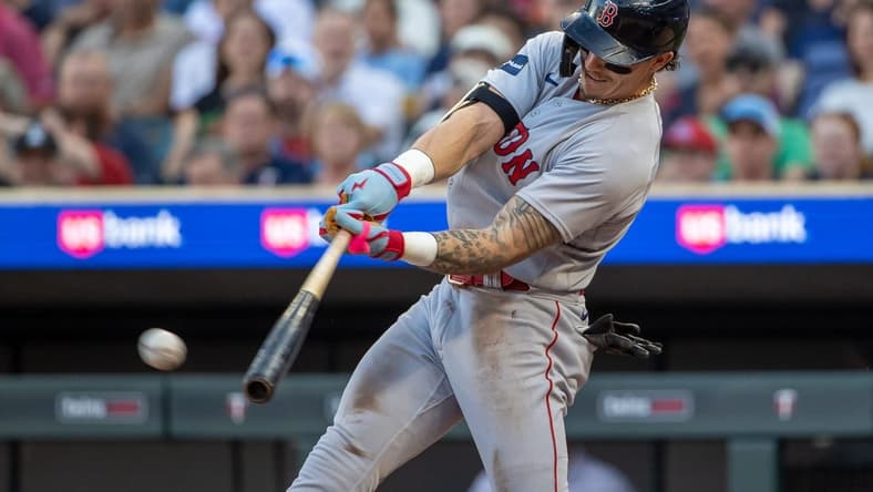 Jun 19, 2023; Minneapolis, Minnesota, USA; Boston Red Sox left fielder Jarren Duran (16) hits a two-RBI double against the Minnesota Twins in the fourth inning at Target Field. Mandatory Credit: Jesse Johnson-USA TODAY Sports