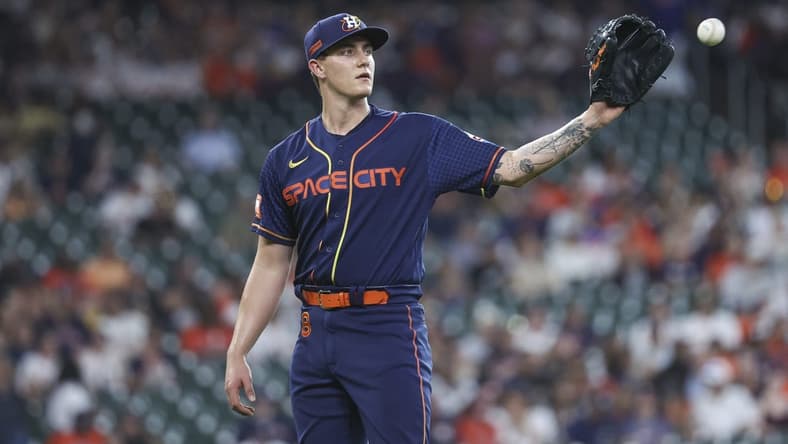Jun 19, 2023; Houston, Texas, USA; Houston Astros starting pitcher Hunter Brown (58) reacts after a play during the first inning against the New York Mets at Minute Maid Park. Mandatory Credit: Troy Taormina-USA TODAY Sports