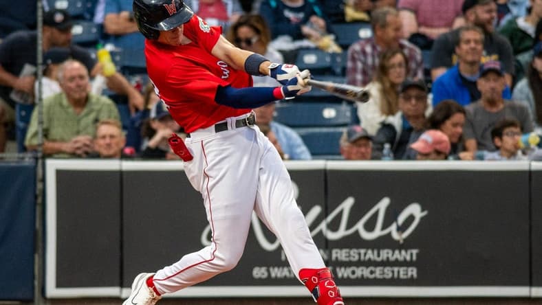 Worcester Red Sox' Bobby Dalbec hits a long home run that hit a train in the fourth inning against the IronPigs on Tuesday, June 20, 2023.