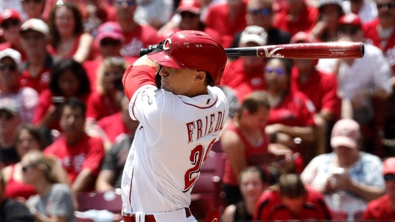 Jun 21, 2023; Cincinnati, Ohio, USA; Cincinnati Reds center fielder TJ Friedl (29) hits an RBI single against the Colorado Rockies during the fifth inning at Great American Ball Park. Mandatory Credit: David Kohl-USA TODAY Sports