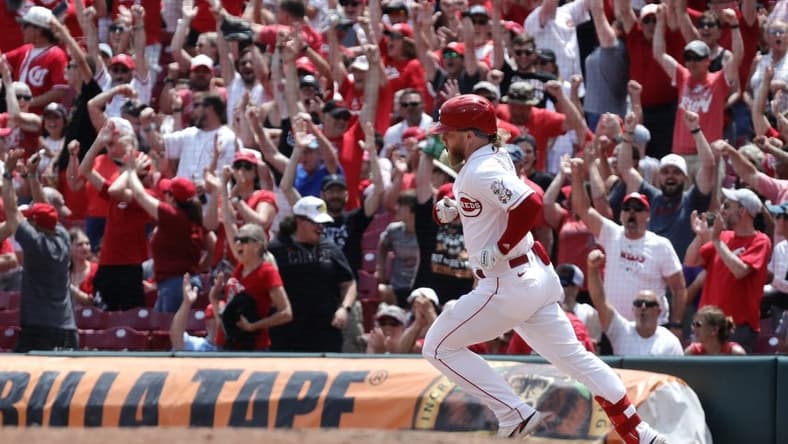 Jun 21, 2023; Cincinnati, Ohio, USA; Cincinnati Reds right fielder Jake Fraley (27) runs after hitting a two-run home run against the Colorado Rockies during the eighth inning at Great American Ball Park. Mandatory Credit: David Kohl-USA TODAY Sports