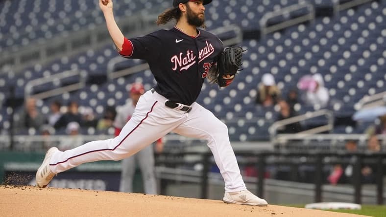 Jun 21, 2023; Washington, District of Columbia, USA; Washington Nationals pitcher Trevor Williams (32) delivers a pitch against the St. Louis Cardinals during the first inning at Nationals Park. Mandatory Credit: Gregory Fisher-USA TODAY Sports