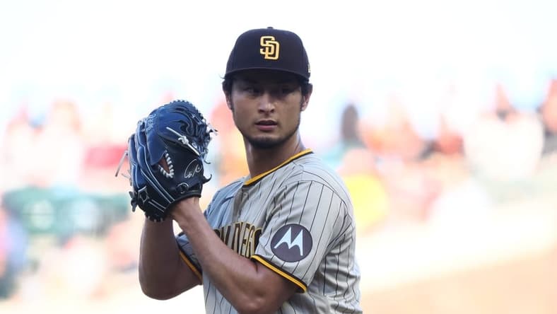 Jun 21, 2023; San Francisco, California, USA; San Diego Padres starting pitcher Yu Darvish (11) winds up for a pitch against the San Francisco Giants during the first inning at Oracle Park. Mandatory Credit: Kelley L Cox-USA TODAY Sports