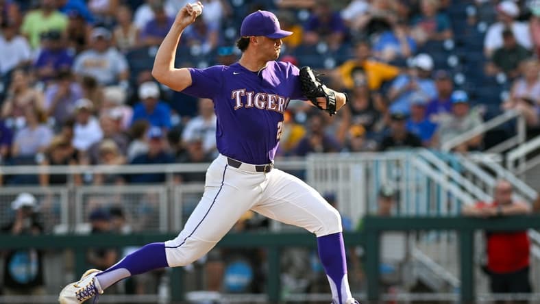 Jun 22, 2023; Omaha, NE, USA; LSU Tigers pitcher Paul Skenes (20) throws against the Wake Forest Demon Deacons in the second inning at Charles Schwab Field Omaha. Mandatory Credit: Steven Branscombe-USA TODAY Sports
