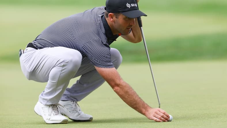 Jun 23, 2023; Cromwell, Connecticut, USA; Denny McCarthy lines up a putt on the seventh green during the second round of the Travelers Championship golf tournament. Mandatory Credit: Vincent Carchietta-USA TODAY Sports