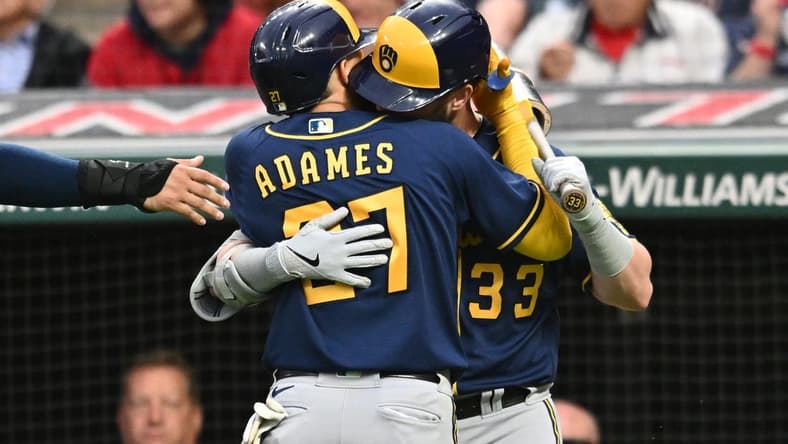 Jun 23, 2023; Cleveland, Ohio, USA; Milwaukee Brewers shortstop Willy Adames (27) celebrates with designated hitter Jesse Winker (33) after hitting a home run during the sixth inning against the Cleveland Guardians at Progressive Field. Mandatory Credit: Ken Blaze-USA TODAY Sports