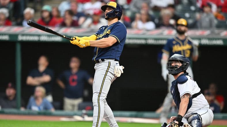 Jun 23, 2023; Cleveland, Ohio, USA; Milwaukee Brewers shortstop Willy Adames (27) and Cleveland Guardians catcher Cam Gallagher (35) watch the flight of the home run hit by Adames during the sixth inning at Progressive Field. Mandatory Credit: Ken Blaze-USA TODAY Sports