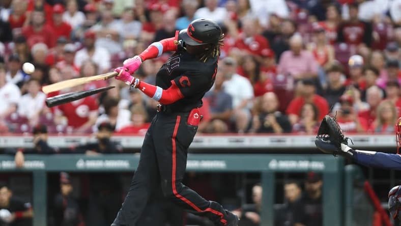 Jun 23, 2023; Cincinnati, Ohio, USA; Cincinnati Reds third baseman Elly De La Cruz (44) breaks his bat hitting a two-run single against the Atlanta Braves during the fifth inning at Great American Ball Park. Mandatory Credit: David Kohl-USA TODAY Sports