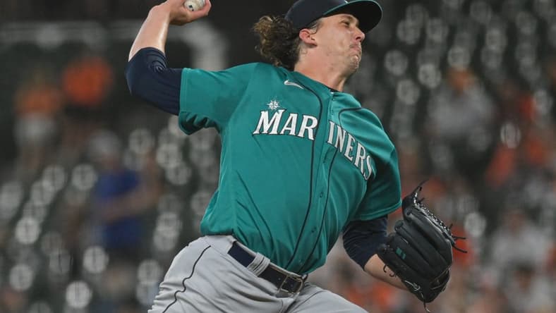 Jun 23, 2023; Baltimore, Maryland, USA; Seattle Mariners starting pitcher Logan Gilbert (36) whines up to throw a first inning pitch against the Baltimore Orioles at Oriole Park at Camden Yards. Mandatory Credit: Tommy Gilligan-USA TODAY Sports