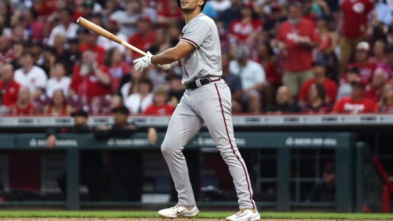 Jun 23, 2023; Cincinnati, Ohio, USA; Atlanta Braves first baseman Matt Olson (28) watches hitting a two-run home run against the Cincinnati Reds during the fifth inning at Great American Ball Park. Mandatory Credit: David Kohl-USA TODAY Sports