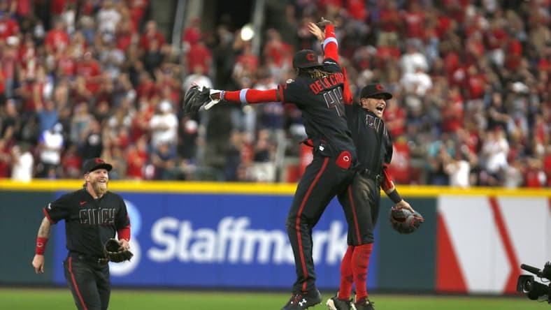 Jun 23, 2023; Cincinnati, Ohio, USA; Cincinnati Reds shortstop Elly De La Cruz (44) celebrates with teammates after they defeated the Atlanta Braves at Great American Ball Park. Mandatory Credit: David Kohl-USA TODAY Sports