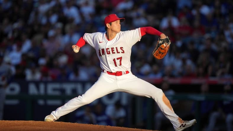 Jun 21, 2023; Anaheim, California, USA; Los Angeles Angels starting pitcher Shohei Ohtani (17) throws in the third inning against the Los Angeles Dodgers at Angel Stadium. Mandatory Credit: Kirby Lee-USA TODAY Sports