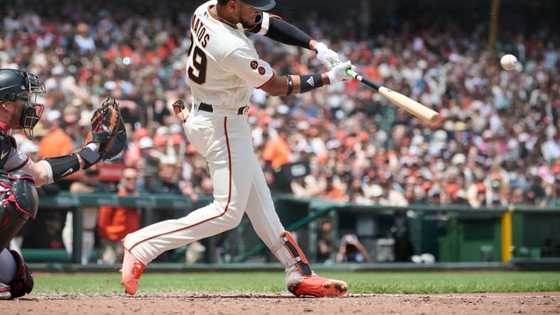 Jun 24, 2023; San Francisco, California, USA; San Francisco Giants outfielder Luis Matos (29) hits a single against the Arizona Diamondbacks during the fourth inning at Oracle Park. Mandatory Credit: Robert Edwards-USA TODAY Sports