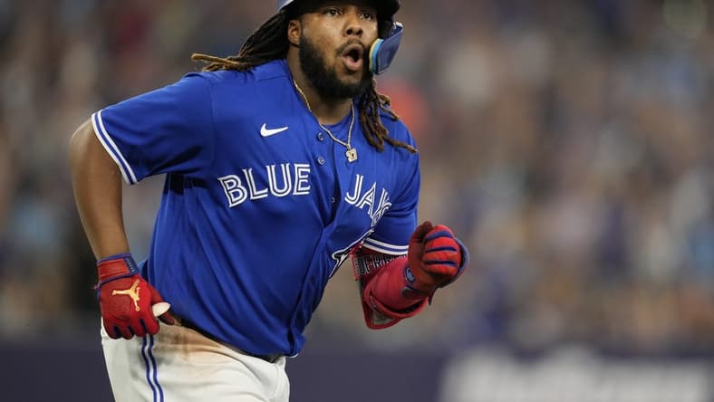 Jun 24, 2023; Toronto, Ontario, CAN; Toronto Blue Jays first baseman Vladimir Guerrero Jr. (27) reacts after hitting a two run home run against the Oakland Athletics during the sixth inning at Rogers Centre. Mandatory Credit: John E. Sokolowski-USA TODAY Sports