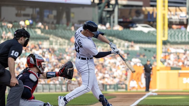 Jun 24, 2023; Detroit, Michigan, USA; Detroit Tigers first baseman Spencer Torkelson (20) swings and makes contact in the first inning against the Minnesota Twins at Comerica Park. Mandatory Credit: David Reginek-USA TODAY Sports