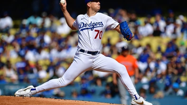 Jun 24, 2023; Los Angeles, California, USA; Los Angeles Dodgers starting pitcher Bobby Miller (70) throws against the Houston Astros during the first inning at Dodger Stadium. Mandatory Credit: Gary A. Vasquez-USA TODAY Sports