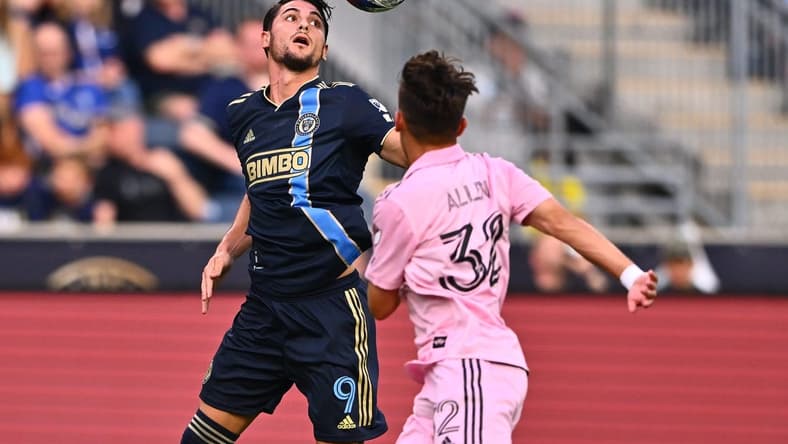 Jun 24, 2023; Philadelphia, Pennsylvania, USA; Philadelphia Union forward Julian Carranza (9) battles for the ball against Inter Miami defender Noah Allen (32) during the first half at Subaru Park. Mandatory Credit: Kyle Ross-USA TODAY Sports