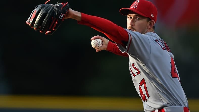 Jun 24, 2023; Denver, Colorado, USA; Los Angeles Angels starting pitcher Griffin Canning (47) delivers a pitch in the first inning against the Colorado Rockies at Coors Field. Mandatory Credit: John Leyba-USA TODAY Sports