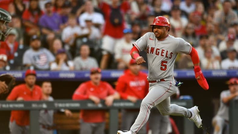 Jun 24, 2023; Denver, Colorado, USA; Los Angeles Angels third baseman Eduardo Escobar (5) sprints home to score in the third inning against the Colorado Rockies at Coors Field. Mandatory Credit: John Leyba-USA TODAY Sports