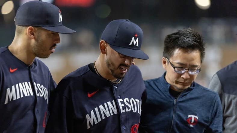 Jun 24, 2023; Detroit, Michigan, USA; Minnesota Twins relief pitcher Jose De Leon (87) leaves the game during his warmups with an injury before the start of the eighth inning against the Detroit Tigers at Comerica Park. Mandatory Credit: David Reginek-USA TODAY Sports