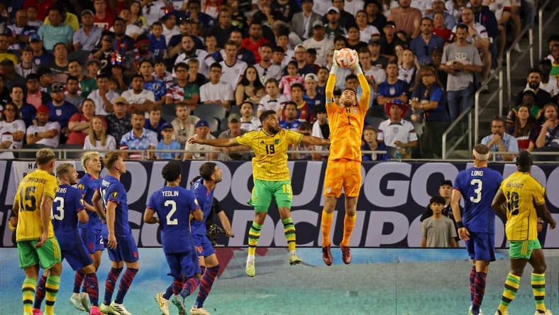 Jun 24, 2023; Chicago, Illinois, USA; United States goalkeeper Matt Turner (1) makes a save against Jamaica defender Adrian Mariappa (19) during the first half at Soldier Field. Mandatory Credit: Jon Durr-USA TODAY Sports