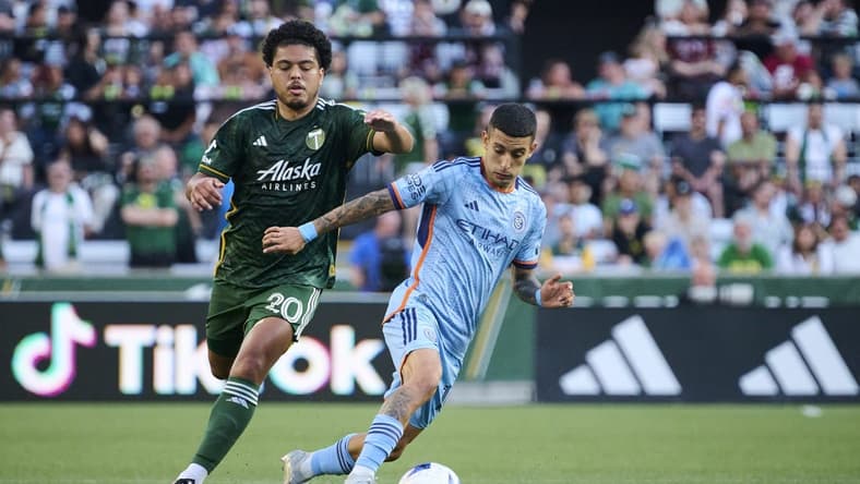 Jun 24, 2023; Portland, Oregon, USA; New York City midfielder Santiago Rodriguez (10) controls the ball during the first half against Portland Timbers midfielder Evander (20) at Providence Park. Mandatory Credit: Troy Wayrynen-USA TODAY Sports