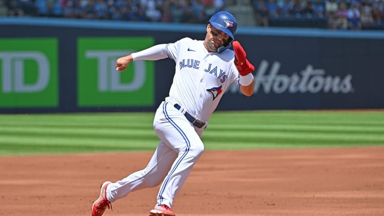 Jun 25, 2023; Toronto, Ontario, CAN; Toronto Blue Jays left fielder Whit Merrifield (15) rounds third base as he scores a run against the Oakland Athletics in the first inning at Rogers Centre. Mandatory Credit: Dan Hamilton-USA TODAY Sports