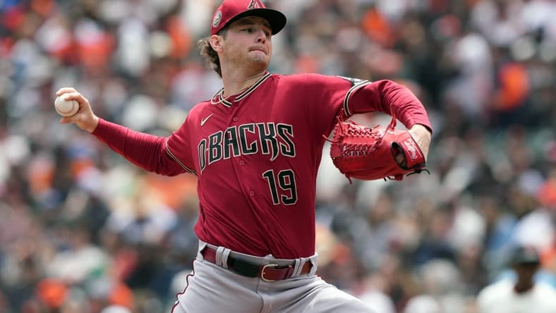 Jun 25, 2023; San Francisco, California, USA; Arizona Diamondbacks starting pitcher Ryne Nelson (19) throws a pitch against the San Francisco Giants during the first inning at Oracle Park. Mandatory Credit: Darren Yamashita-USA TODAY Sports