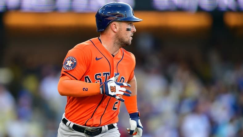 Jun 25, 2023; Los Angeles, California, USA; Houston Astros third baseman Alex Bregman (2) runs after hitting an RBI single against the Los Angeles Dodgers during the eleventh inning at Dodger Stadium. Mandatory Credit: Gary A. Vasquez-USA TODAY Sports