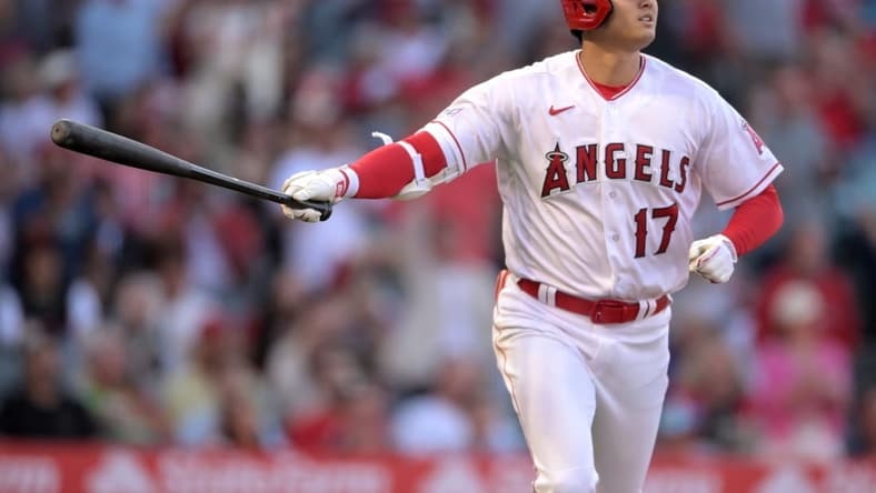 Jun 26, 2023; Anaheim, California, USA; Los Angeles Angels designated hitter Shohei Ohtani (17) watches the flight of the ball on a solo home run in the fourth inning against the Chicago White Sox at Angel Stadium. Mandatory Credit: Jayne Kamin-Oncea-USA TODAY Sports